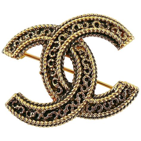 plain gold chanel brooch|vintage chanel brooches.